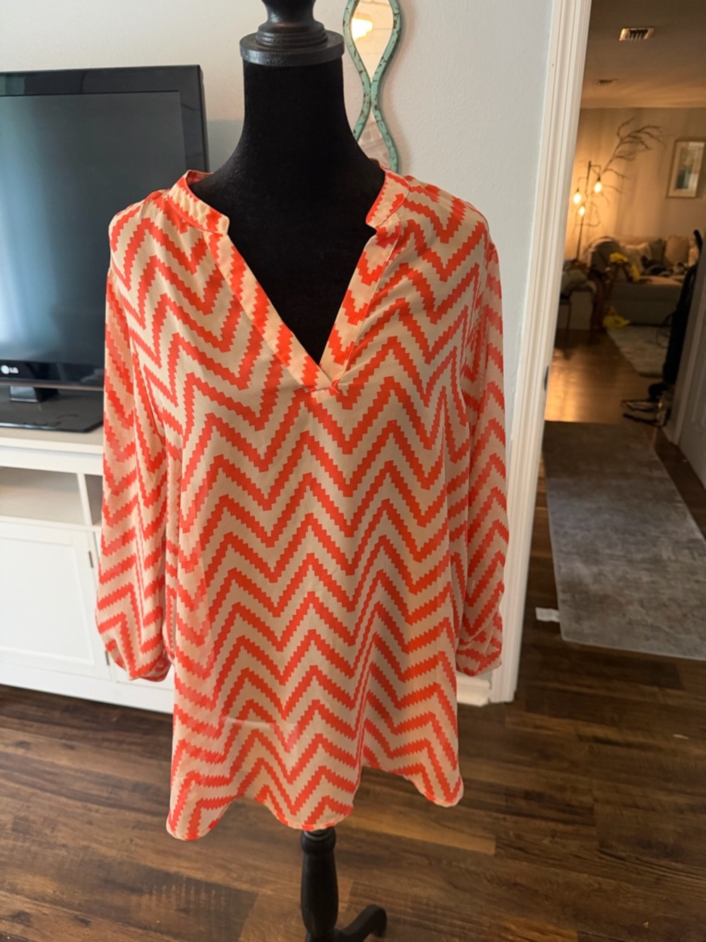 No Boundaries Coral and Cream Chevron V-Neck Blouse